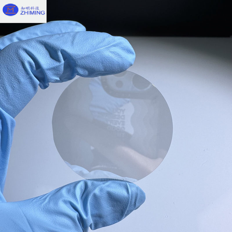 Σιλικονικό καρβίδιο Wafer Προσαρμοσμένο μέγεθος Ημιμονωτικό SiC Wafers Σχεδόν άχρωμο Διαφανές Αντίσταση υψηλής πίεσης
